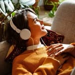 brunette young woman listening music